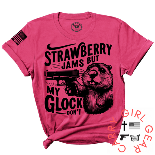 Pink t-shirt with a graphic of a beaver holding a gun and text on a white background