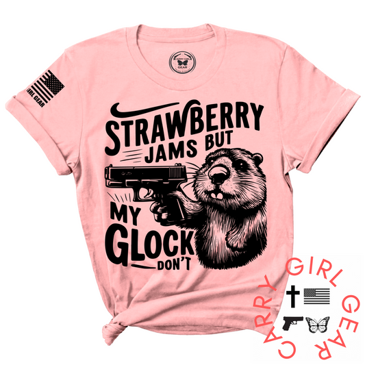 Pink t-shirt with a graphic of a beaver holding a gun and text on a white background